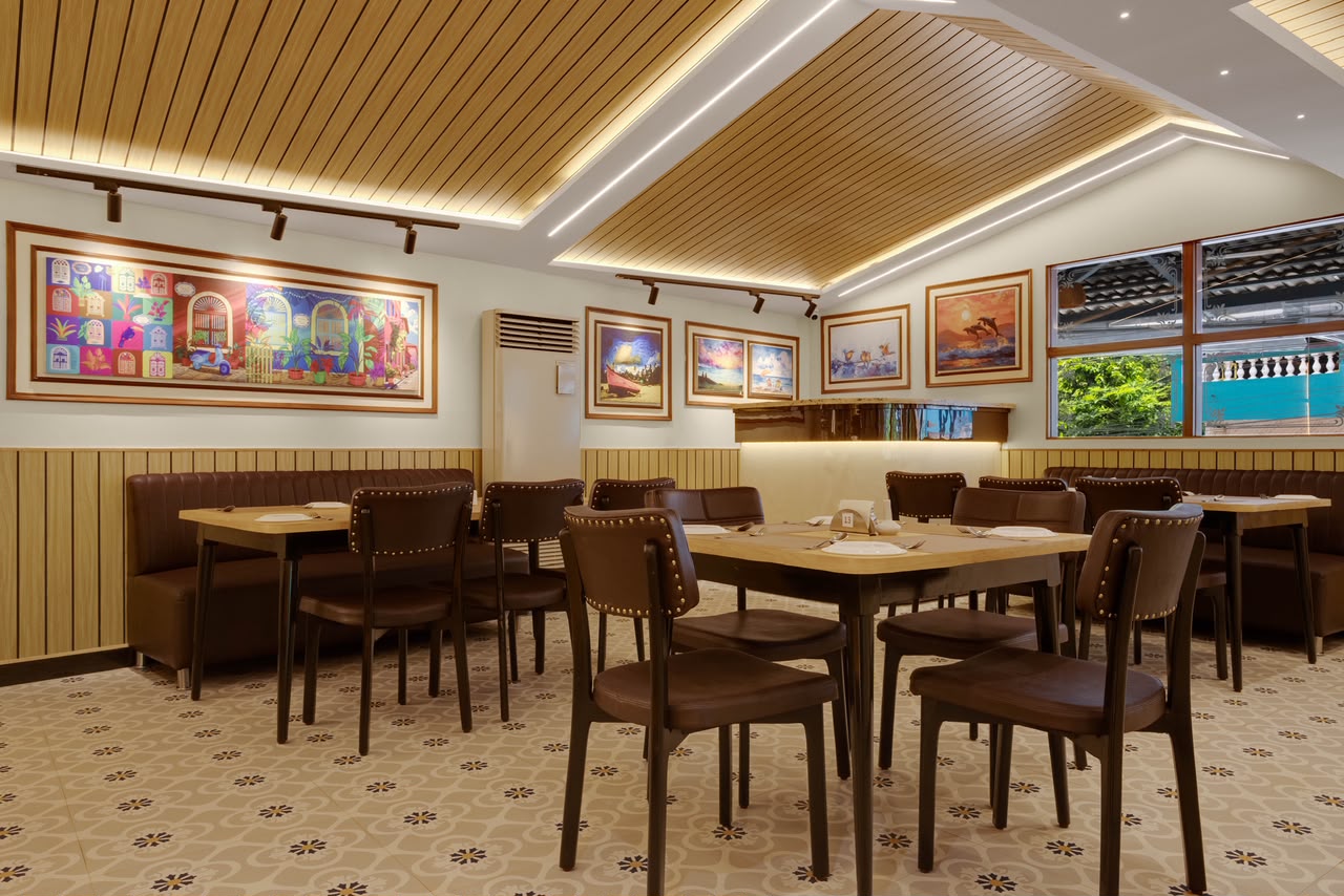 Balcão's dining room, with framed artwork along the wall